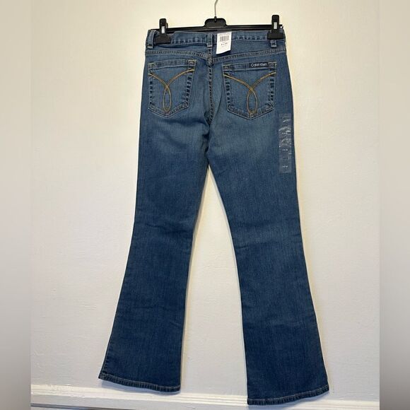 Calvin Klein Mid Rise Flared Fit Jeans in blue size 4 - Picture 3 of 9